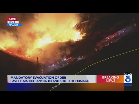 Franklin Fire jumps Malibu Canyon Road, spans west